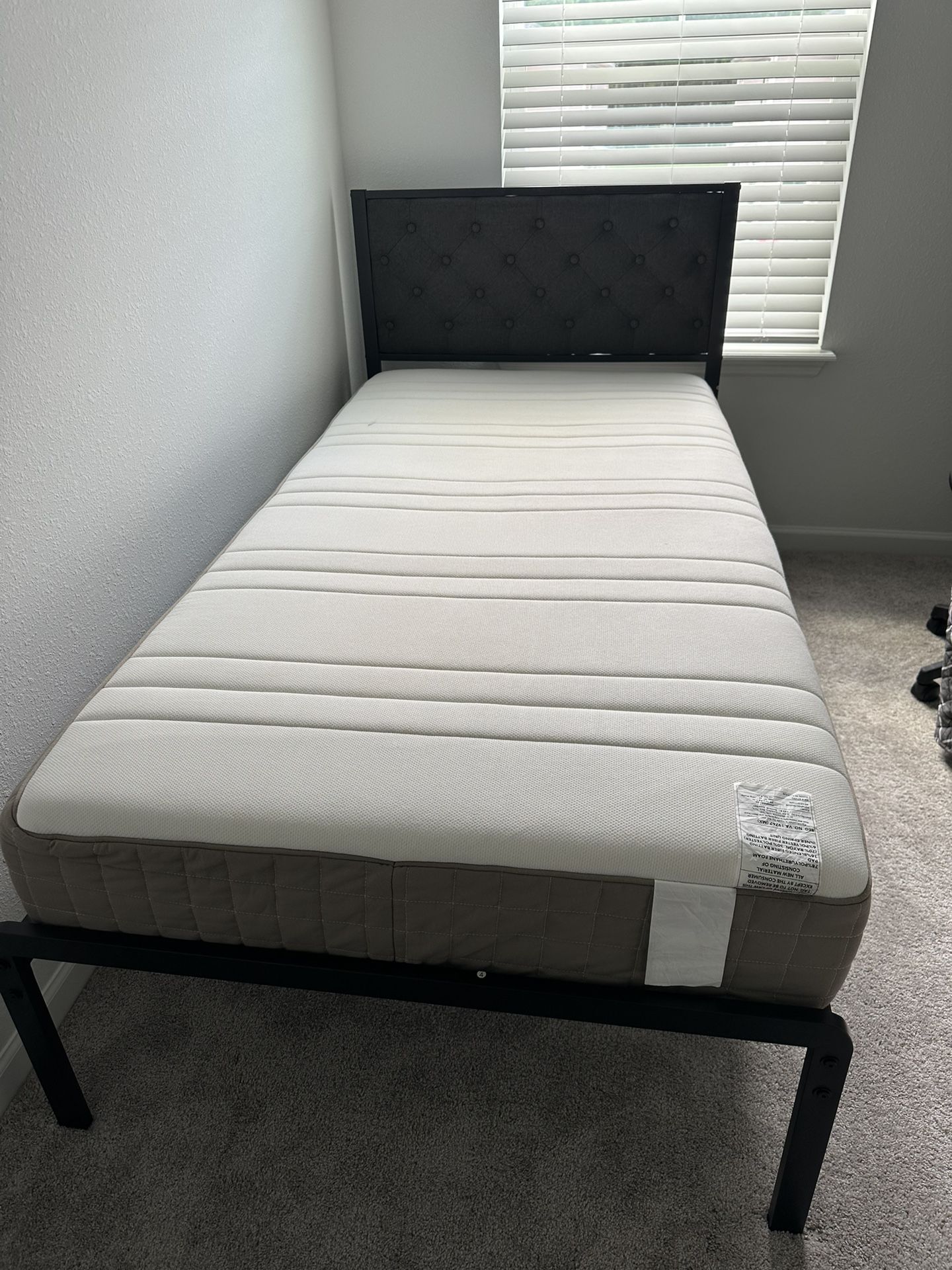 Brand new twin xl bed frame and Ikea twin xl mattress(used)