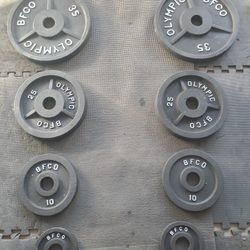 Olympic Weight Set Includes 2x35lbs 2x25lbs 2x10lbs &  2x2½lbs That's 145lbs all together 