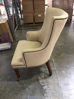 Upholstered Off-White Side Chairs with Antique Brass Front Casters - Qty 2