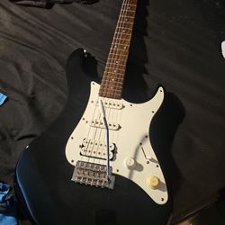 Electric Yamaha Guitar And Speaker 