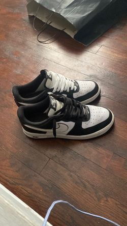 nike air force 1 sneakers in black and white