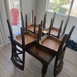 Wooden dining table with 4 chairs