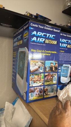 Arctic air fans cordless with mist , and colored lights