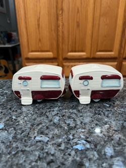 Vintage Ceramic Camper Trailer Pair of Salt and Pepper Shakers.  Size approximately 2 1/2 inches tall and 3 1/2 inches wide.  Brand new with tags on t