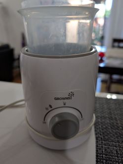 Free working bottle warmer