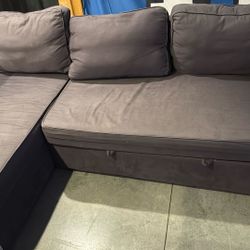 Ikea Dark Grey Sleeper Sofa with storage Chaise