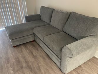 Sofa with chaise and ottoman