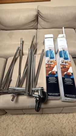 3 Clothing Racks - 1 metal, 2 plastic
