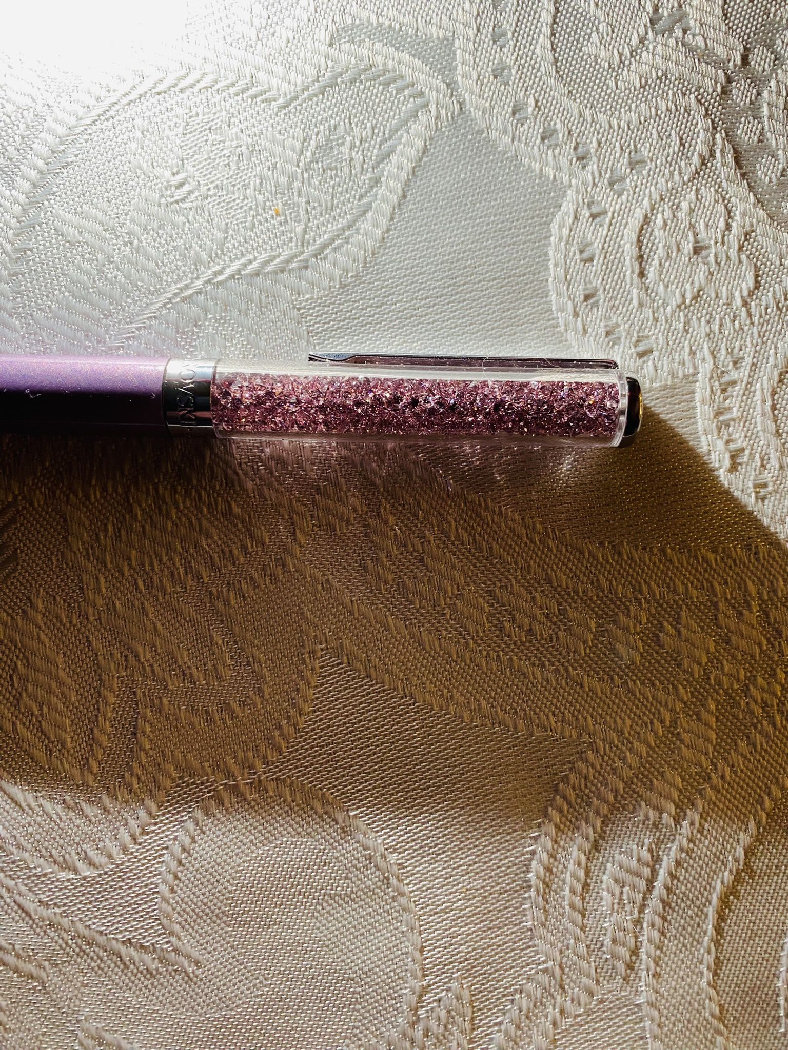 Swarovski Crystalline Ballpoint Pen, Black Ink in Lilac Colored Casing, Crystal Design, from the Crystalline Collection. Brand new. Excellent as a gif