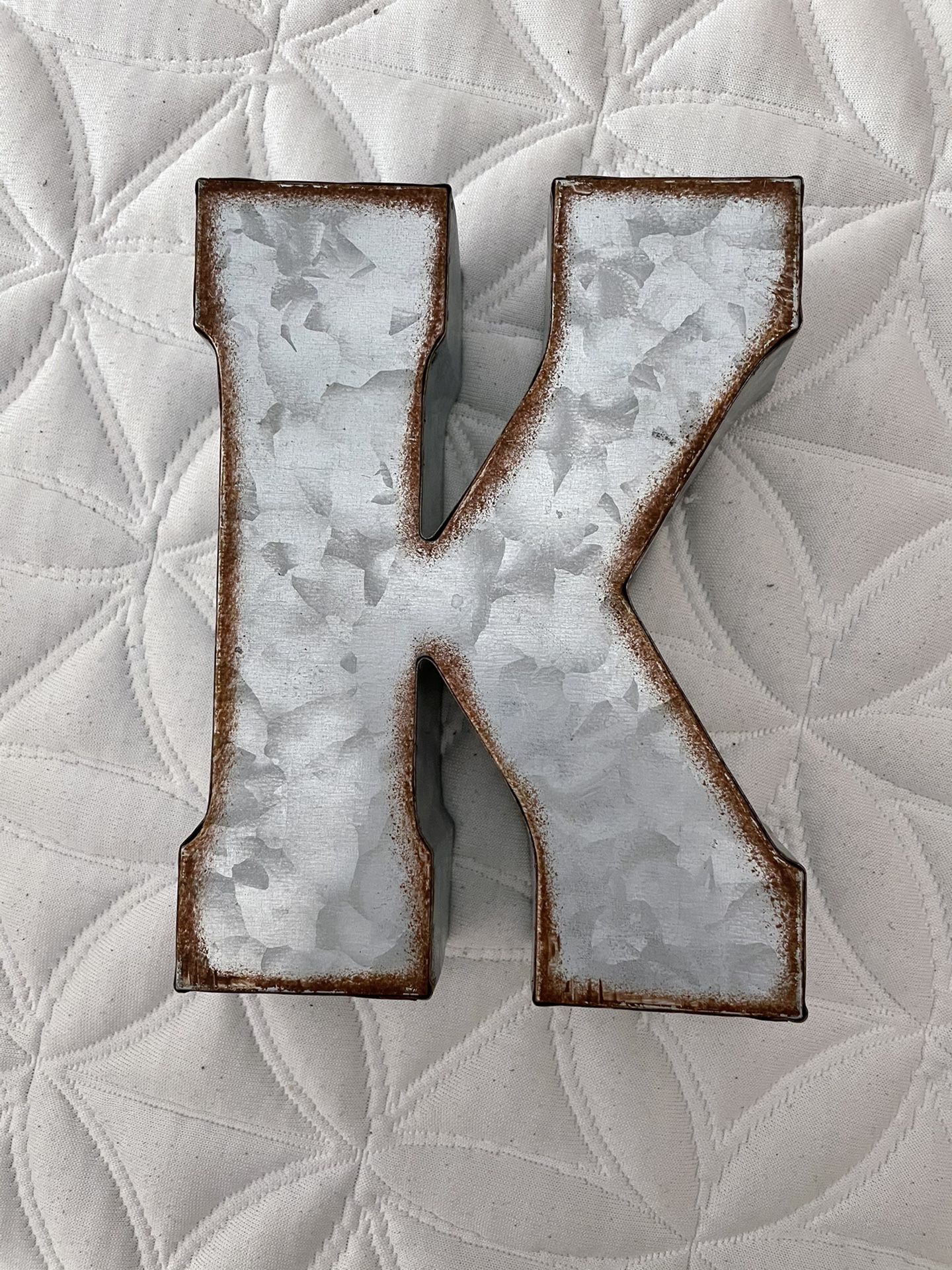 Metal letter K