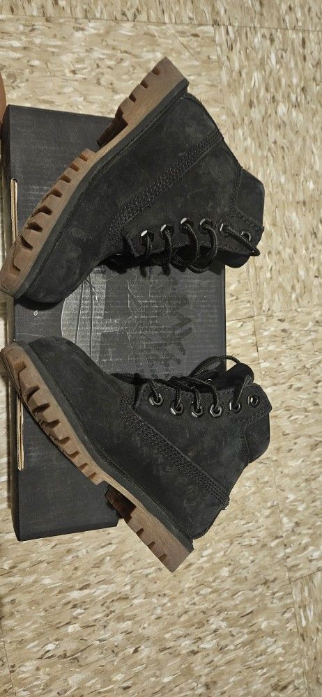 Kids Black Timberlands.