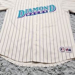 Size XL 90s Majestic Arizona Diamondback Jersey White Pinstripe.
Size XL. Missing tags.
