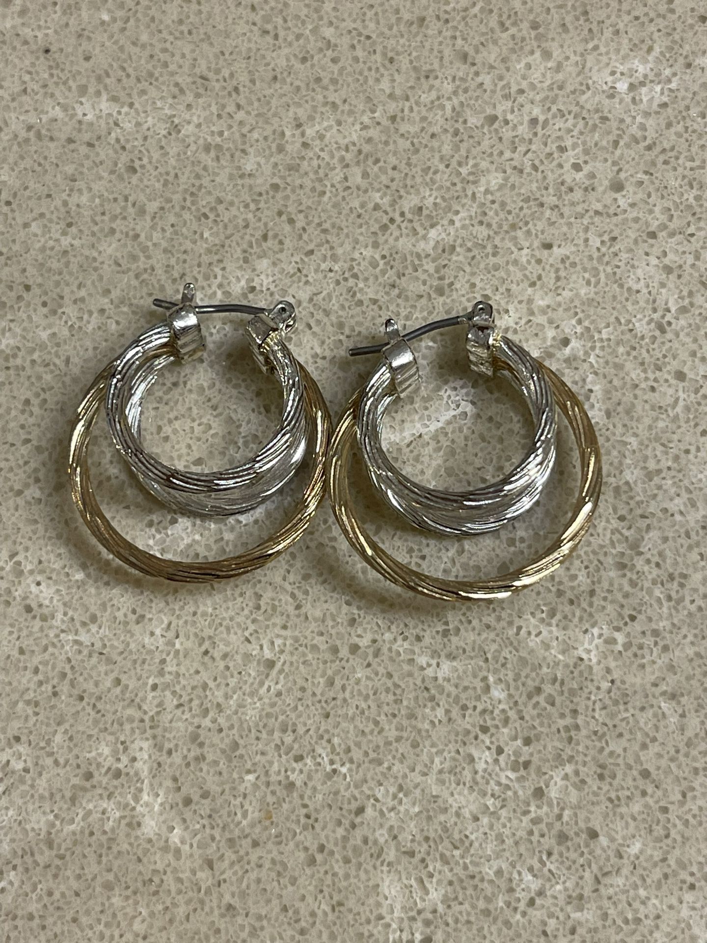 Vintage two tone hoop earrings, good condition. Pet and smoke free home. 