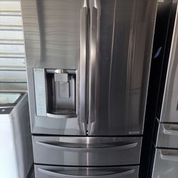 LG Dark Stainless Steel Refrigerator And Freezer