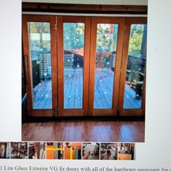 Selling 4 Exterior Wood French Doors With Sliding Accordion Style Fold Away System.