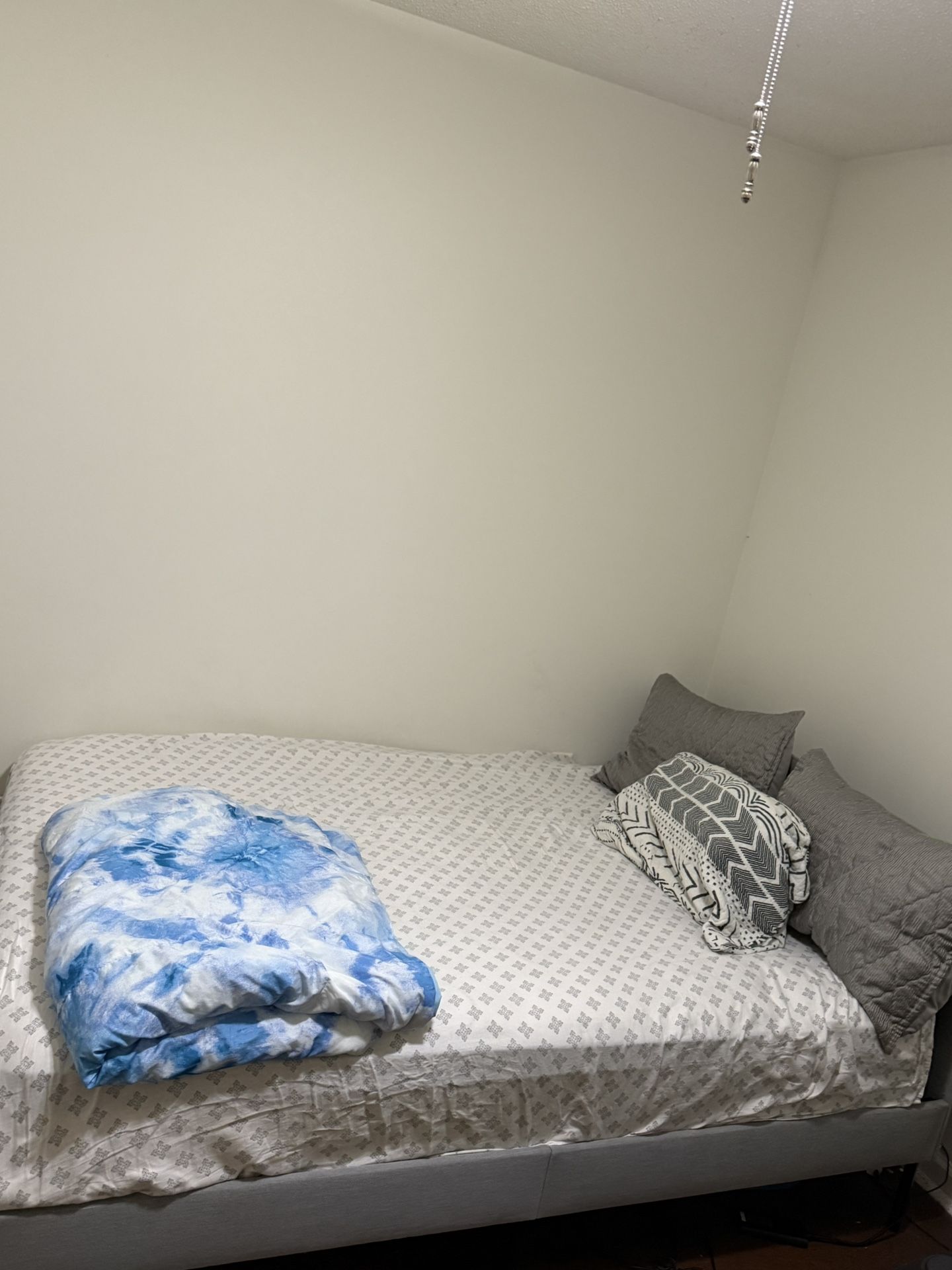 Queen-size IKEA bed frame with mattress – both in good condition. Ready for pickup!