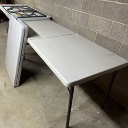 6 folding foldable white plastic tables  Preowned, one has a small dent where it folds.   $50 each or $150 for all 6. Price is firm. 
