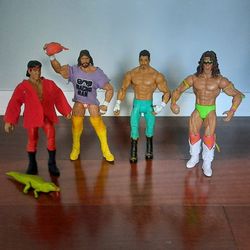 WWE LIMITED EDITION FOUR ACTION FIGURES