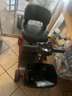 Electric scooter/ wheelchair.