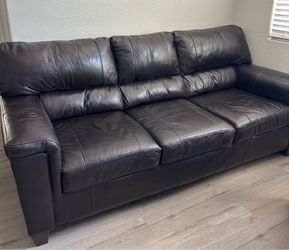 Dark brown, leather sofa and loveseat