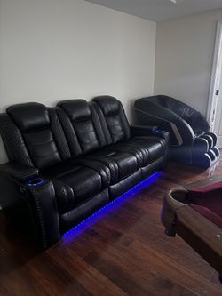 Black Leather Theatre Sofa And Love Seat