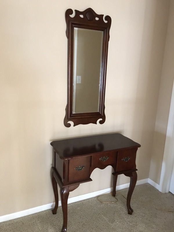 oak console table and mirror