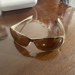 POLISHED GOLD BEHAVE OAKLEY SUN GLASSES 