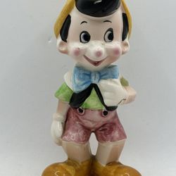 Vintage Pinocchio Ceramic Figure Walt Disney Productions Japan. 5” tall no chips or cracks.