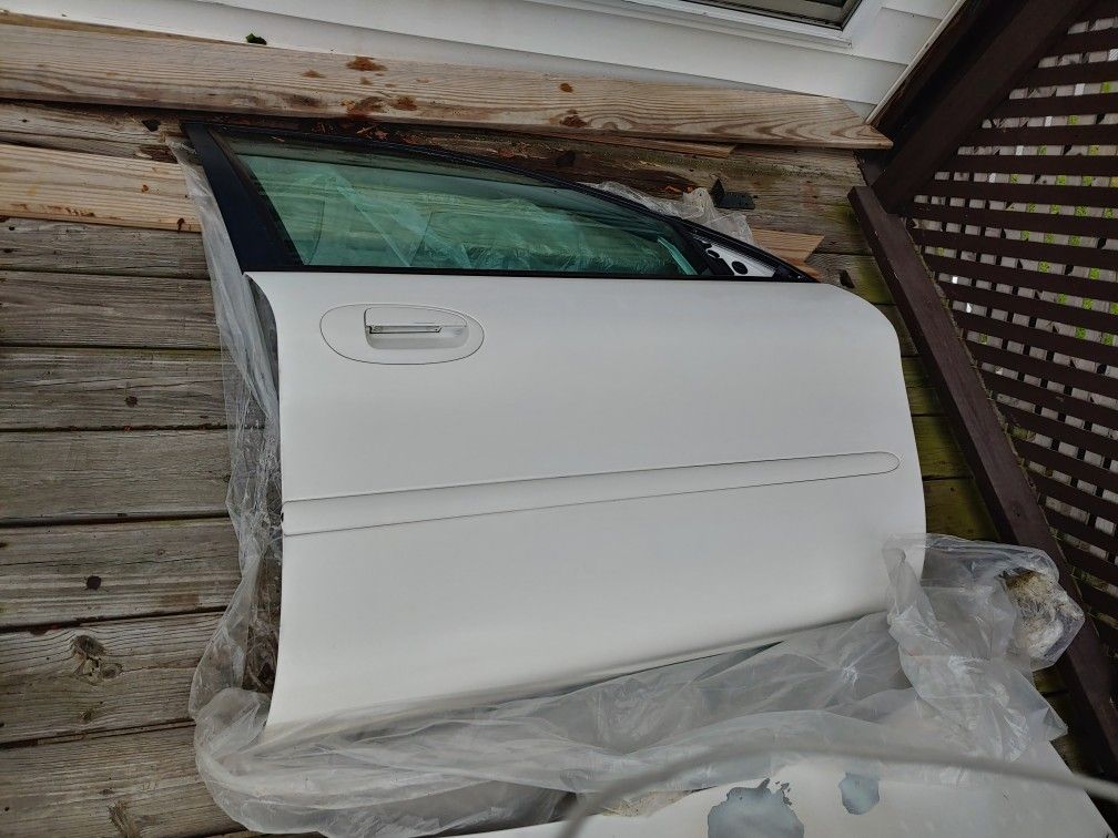 Taurus door and trunk lid; each $50