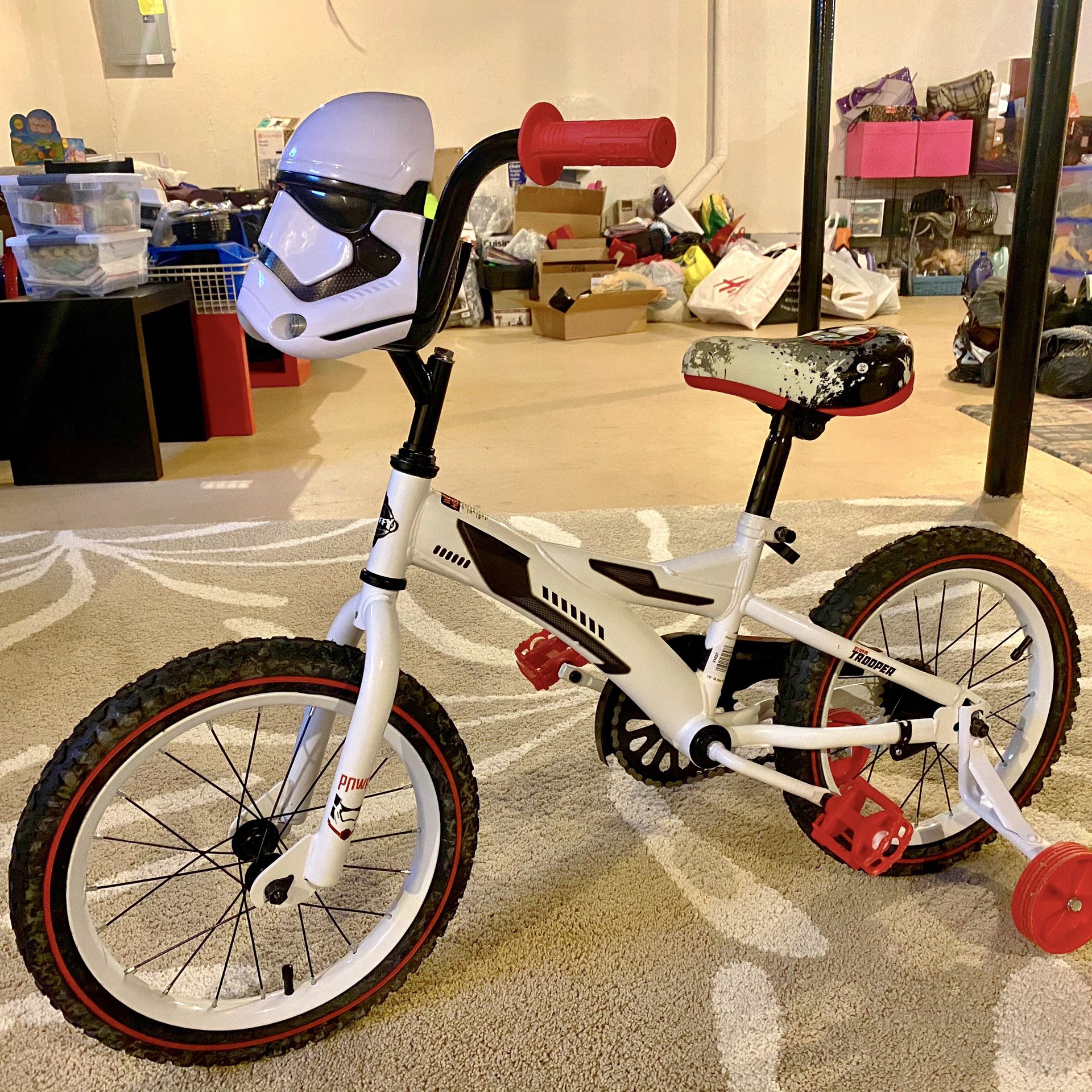Barely used 16 inch stormtrooper kids bike with training wheels.