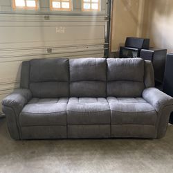 Grey Colored Couch With Two Recliners