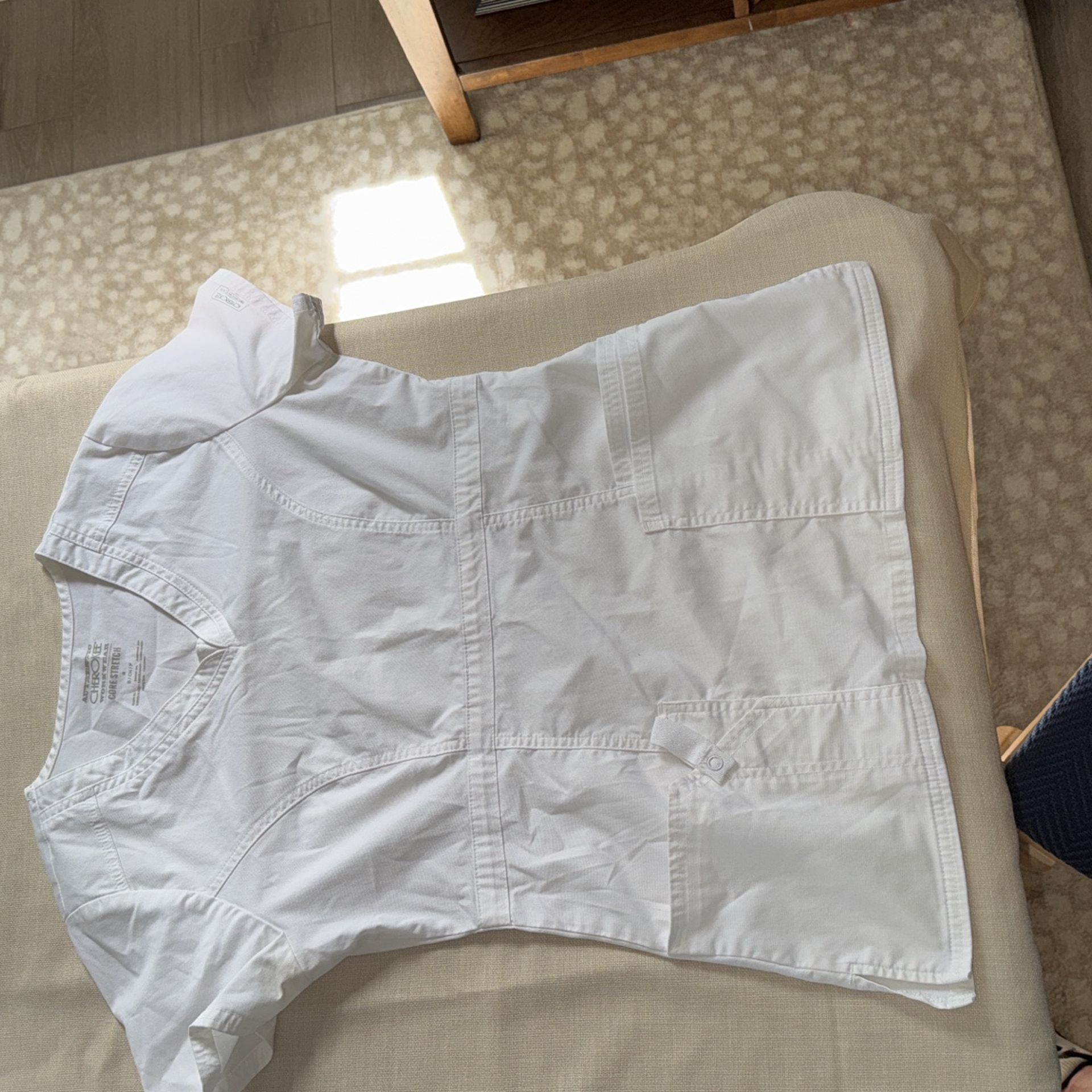 White scrub shirt