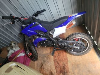 Yellow dirtbike and blue