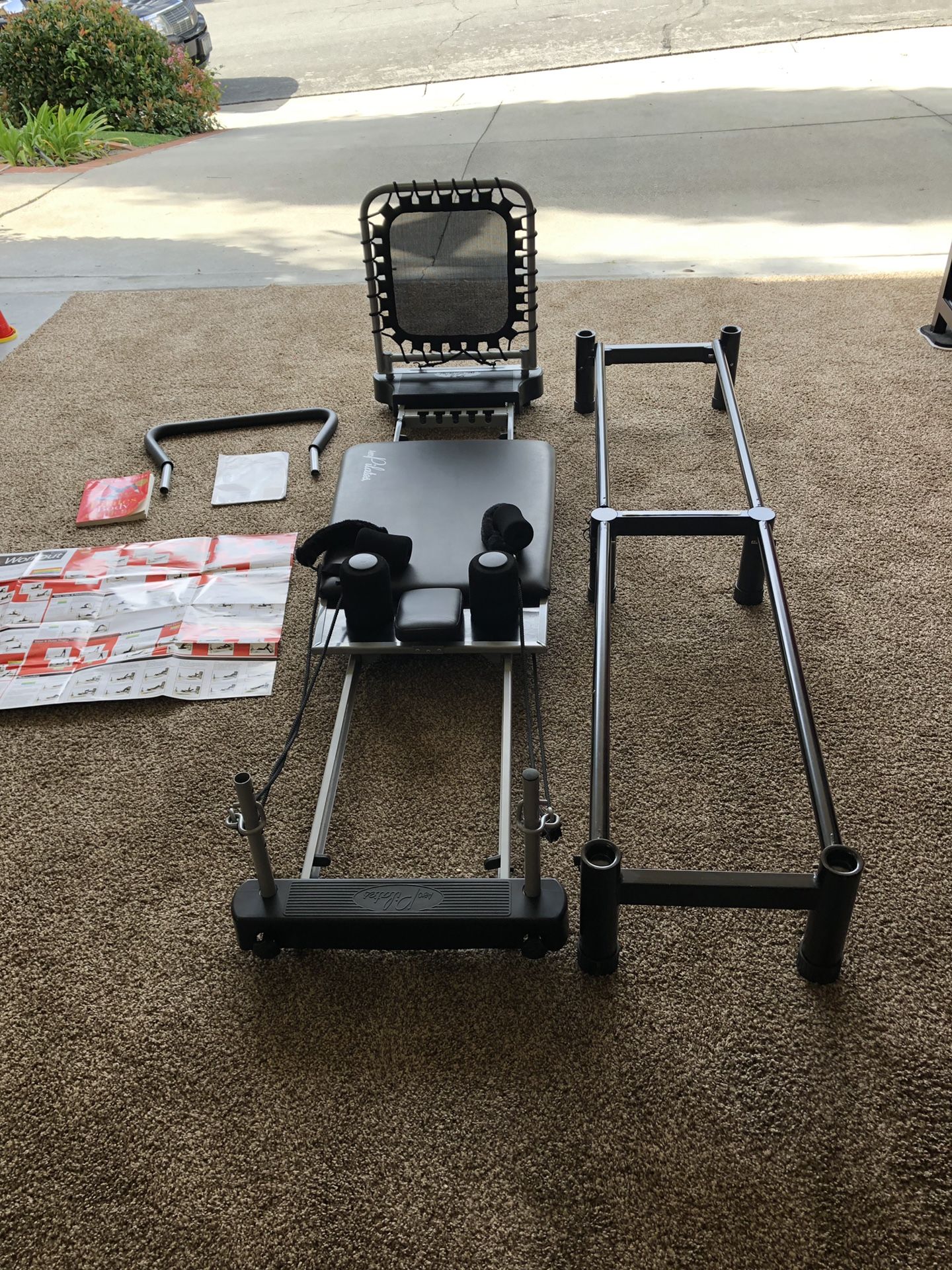 Stamina Aero Pilates performer plus #55-5000 cardio rebounder on stand, foot bar, folds in half, on wheels for easy moving. Owners manual, Pilates bo