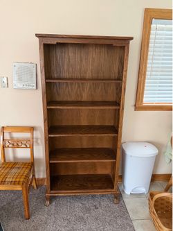 Tall wooden bookshelf