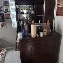 Bar, Punching Bag, Nordic Track Bike, Desk And stand