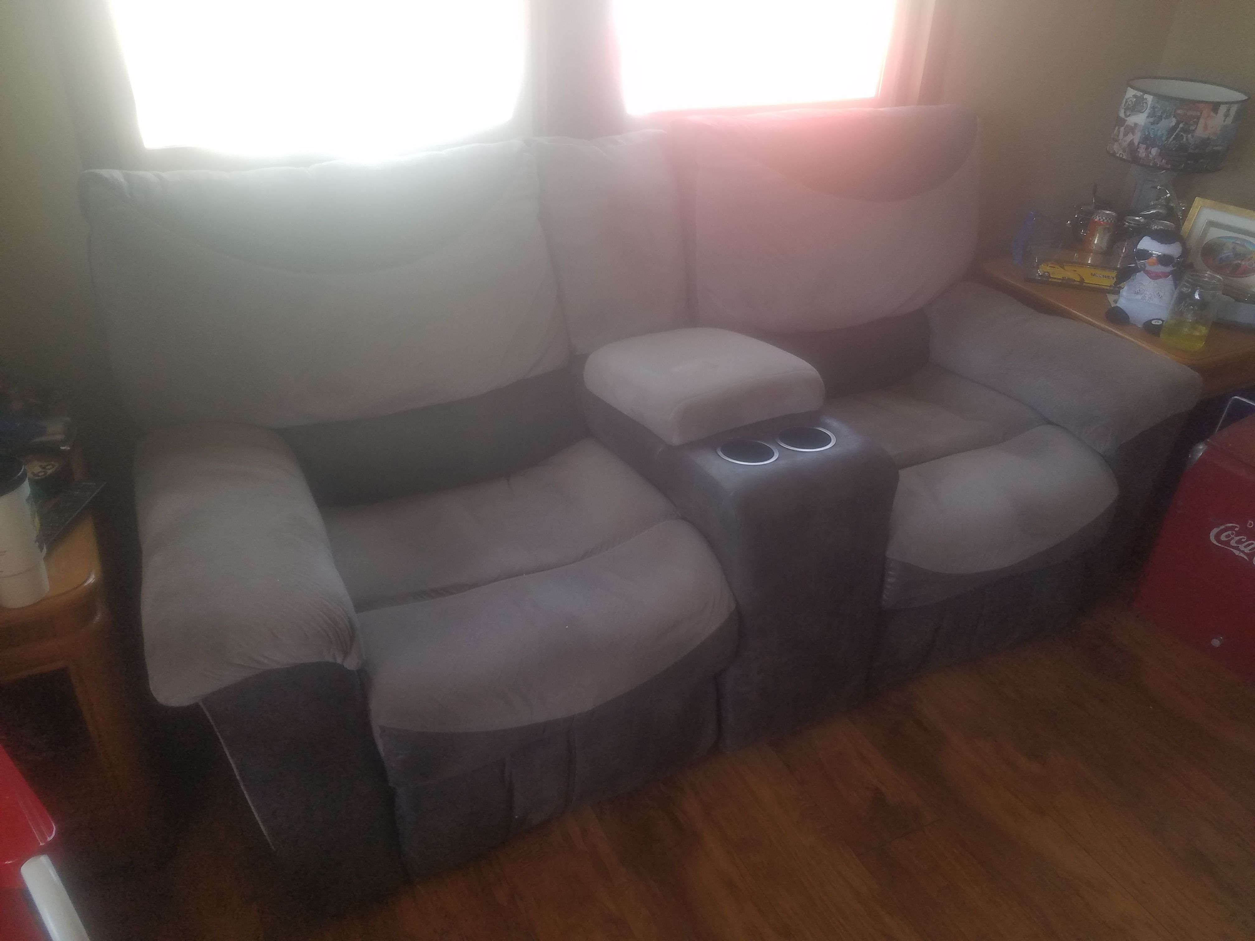 Electric reclining sofa with consol and matching single recliner