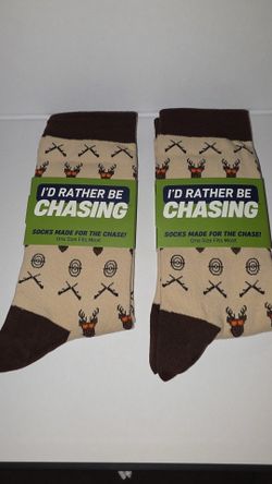 Men’s golf socks one size fits all 5.00 a pair .