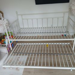 Twin bed with a trundle underneath