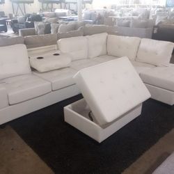 White Faux Leather Cupholder Sectional With Free Storage Ottoman ( Ask For Jose)