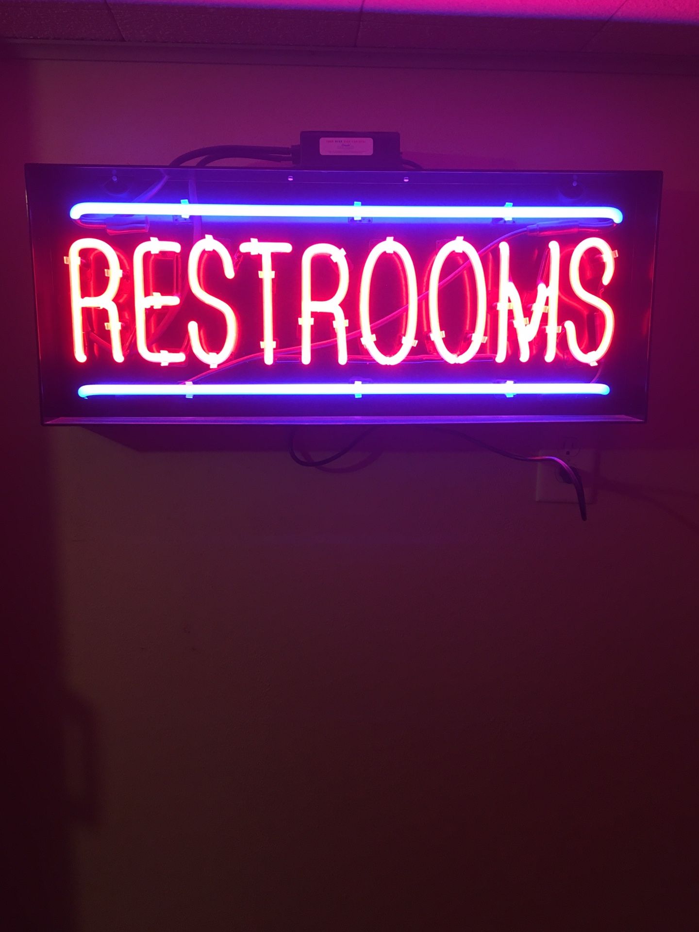 Neon RESTROOM sign