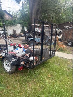 5x8  utility trailer with racks send me an offer