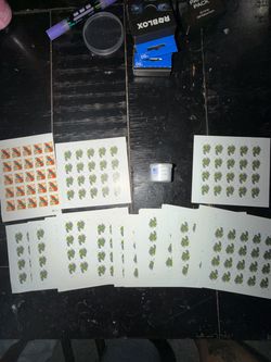 (STAMPS). Coil of 100 roll and complete sheets