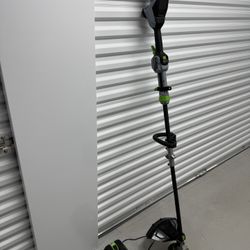 EGO Power+ ST1623T 16-Inch 56-Volt Lithium-Ion Cordless POWERLOAD™ with LINE IQ™ Telescopic Carbon Fiber Straight Shaft String Trimmer, 4.0Ah Battery 