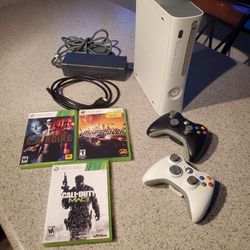 Xbox 360 Game Console With 2 Remotes And 3 Games. No Issues
