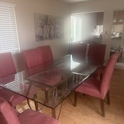 Glass top dining table with 8 chairs