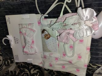 Brand new girl receiving blanket with headband