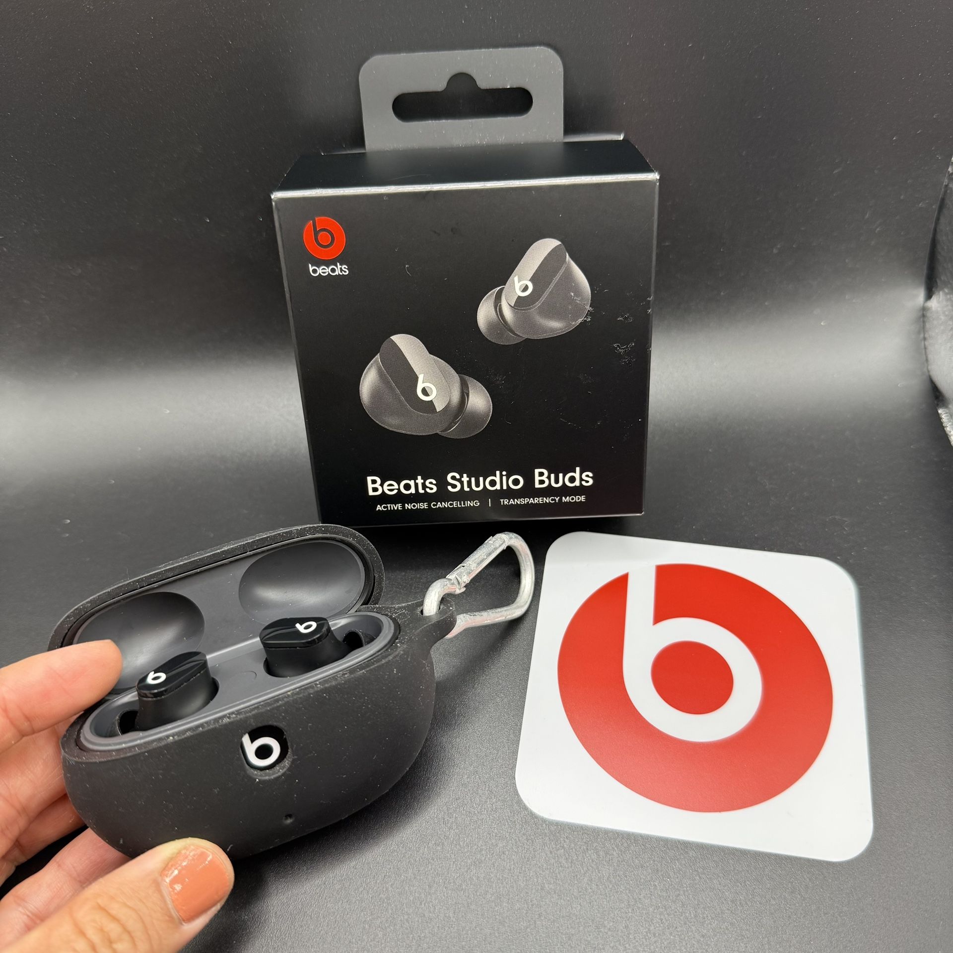 Beats Studio Buds with protective silicone case and clip