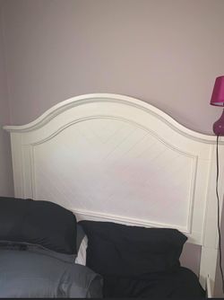 Bed frame with headboard