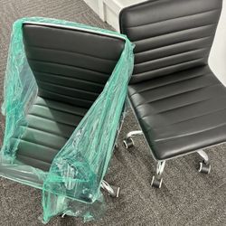 Black leather wheel rolling chairs for office, bedroom, dining, meetings